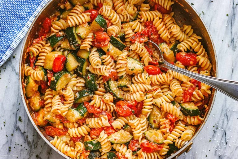 Homemade fresh fusilli pasta recipe served with tomato garlic sauce in a bowl