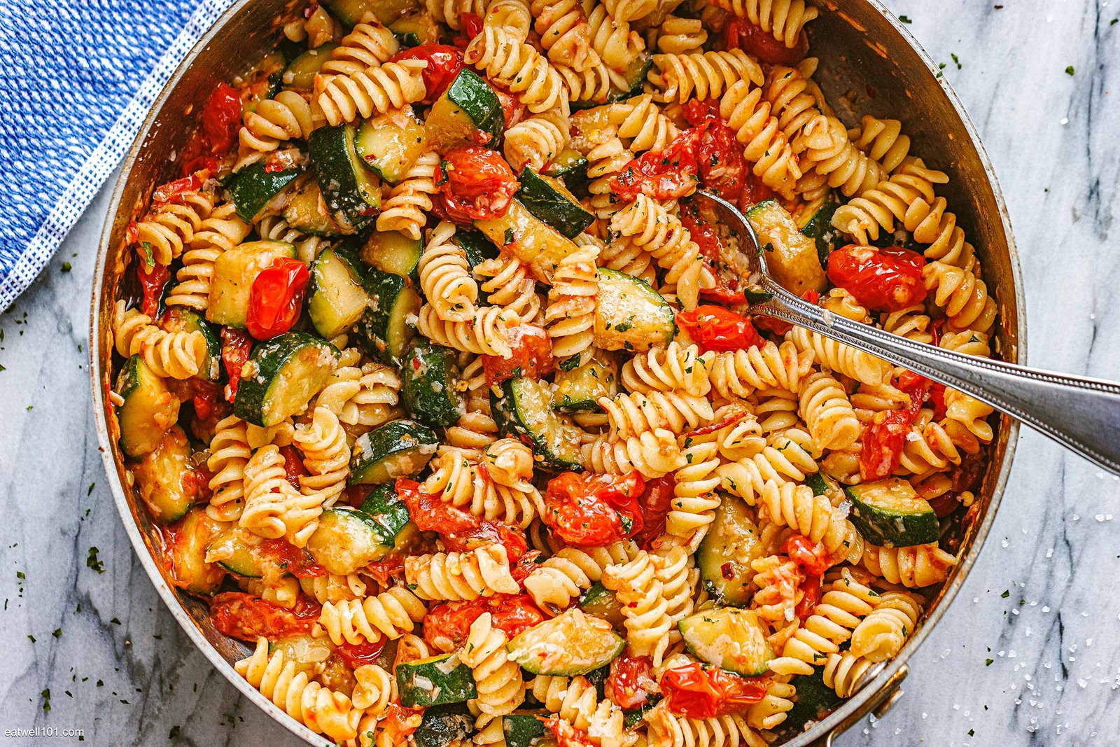 Homemade fresh fusilli pasta recipe served with tomato garlic sauce in a bowl