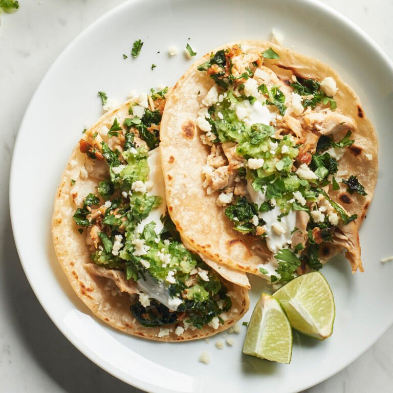 Authentic Mexican street tacos with grilled meat, fresh cilantro, onions, and soft corn tortillas