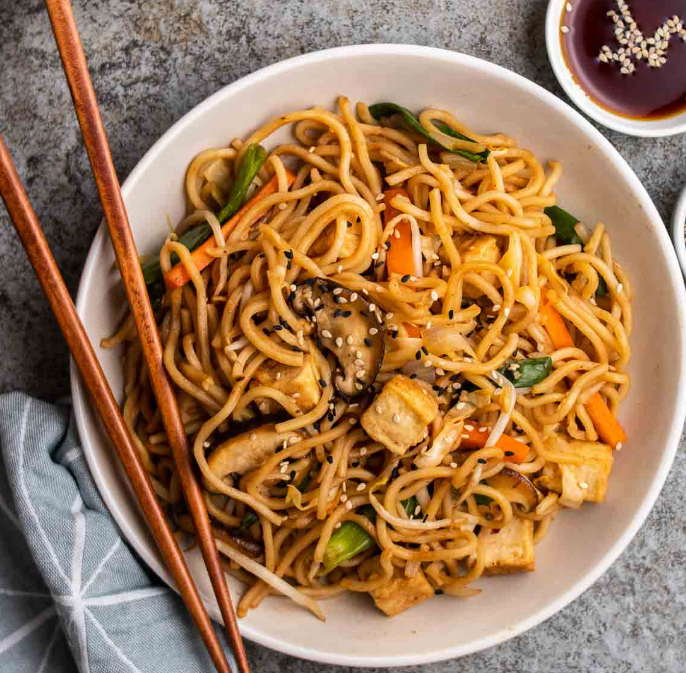 Homemade Japanese Yakisoba noodles with vegetables and savory sauce in a bowl