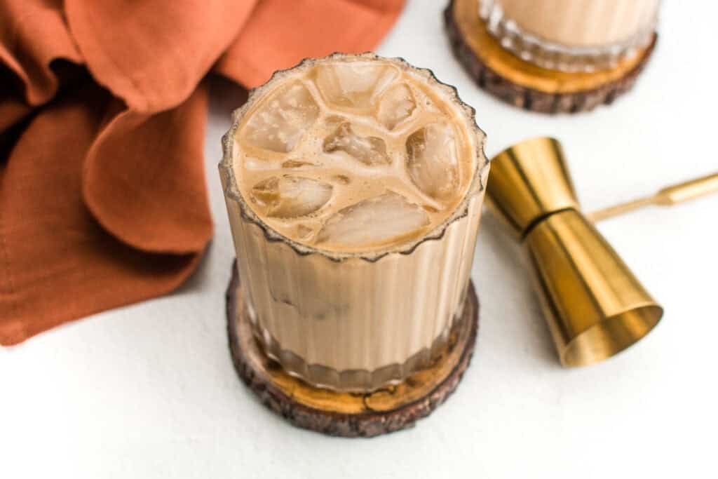 Creamy Colorado Bulldog cocktail served over ice with coffee liqueur, vodka, cream, and cola in a rocks glass.