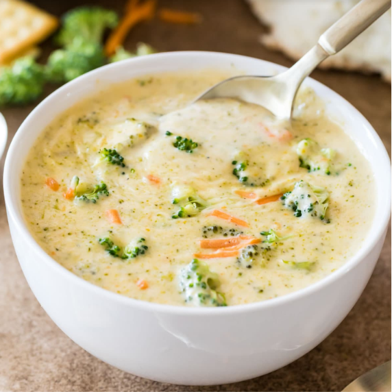 Creamy homemade broccoli cheese soup topped with tender broccoli florets