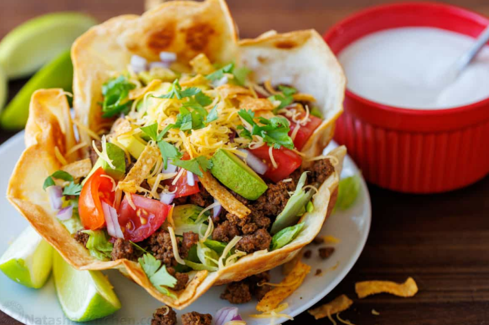 Crispy homemade taco salad shells made with golden flour tortillas